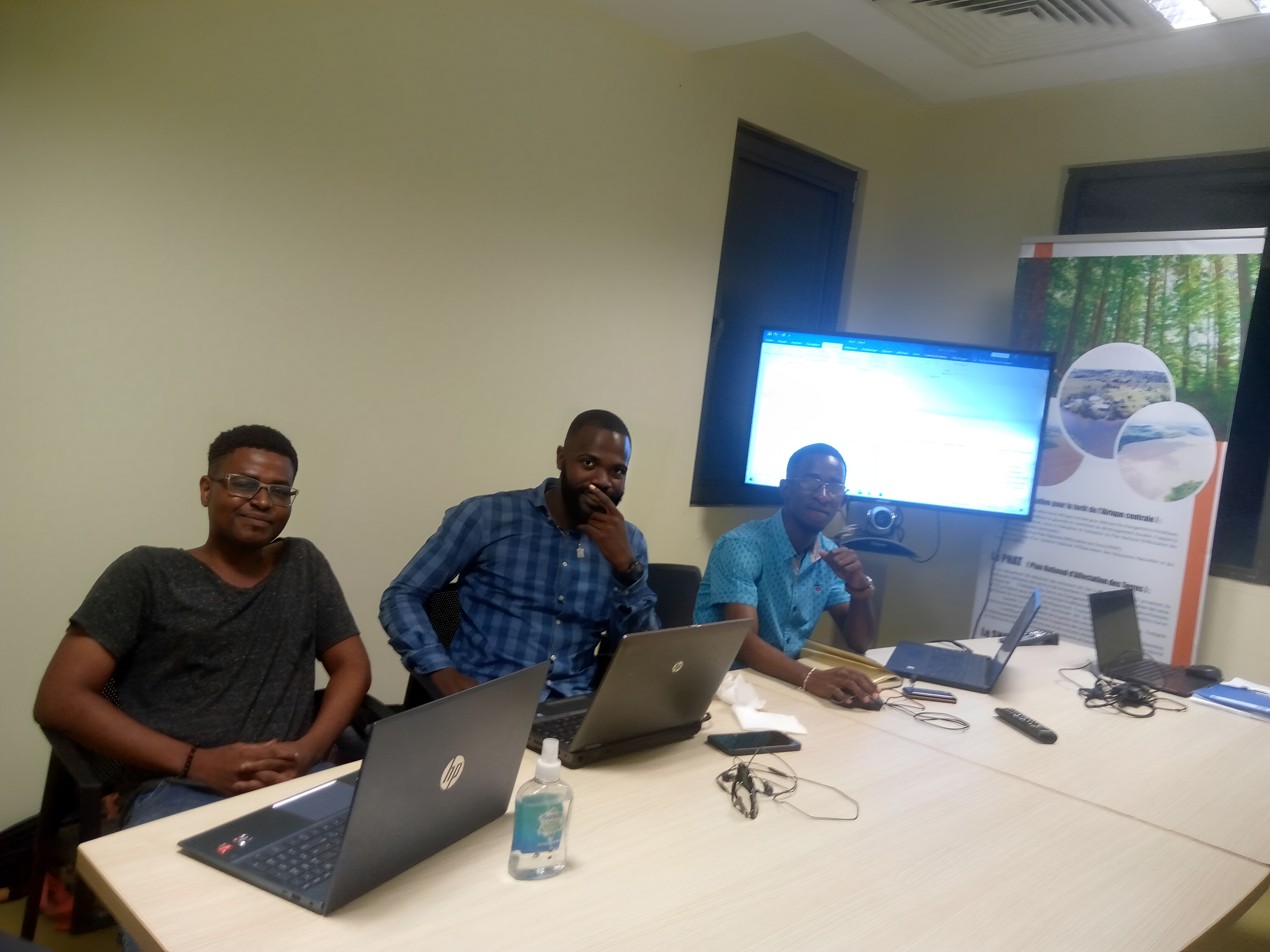 Alfran ESSONE at work with colleagues